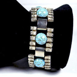 German made bracelet with eight 10mm round Gilson Turquoise cabochons