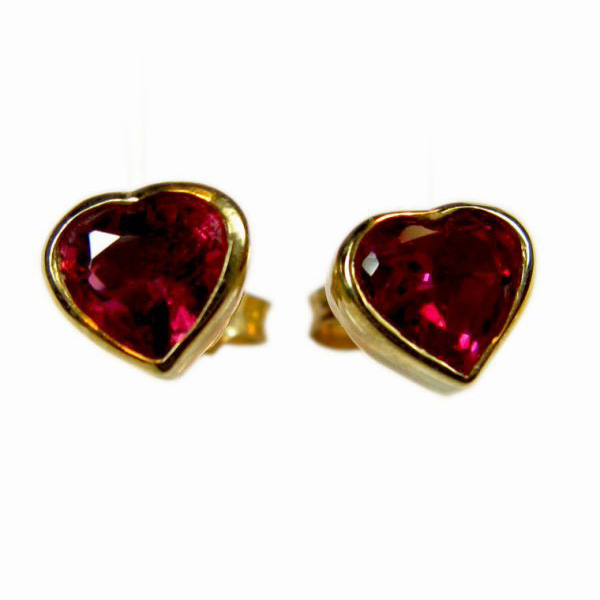 Solid 9 carat yellow gold heart shaped pierced earrings set with matching deep red genuine garnet gemstones