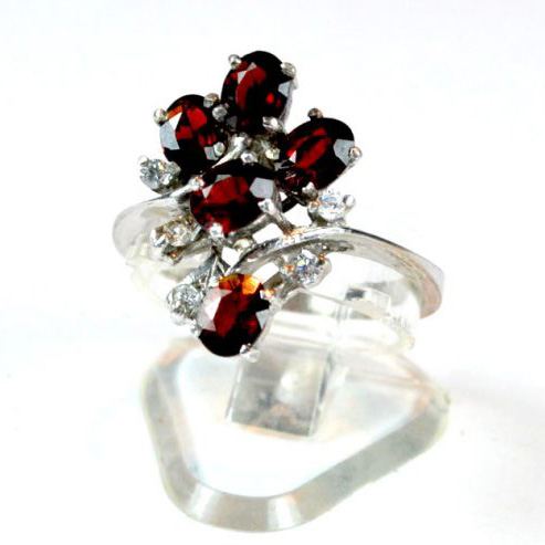 Sterling Silver dress ring with deep red natural garnets intermixed with sparkling faceted cubic zirconias
