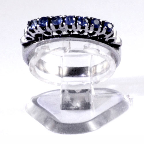 Ladies sterling silver eternity ring with seven small blue sapphires